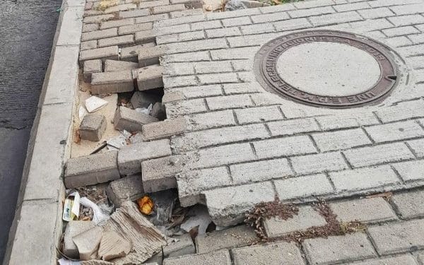 Denuncian falta de reparación en los andenes de la calle 72