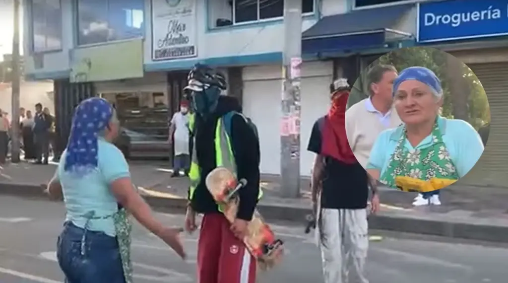 Valiente mujer desafía a encapuchados durante disturbios en el norte de Bogotá