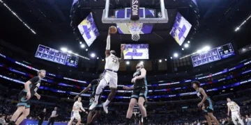 Doncic manda, Booker decide y los Nets respiran